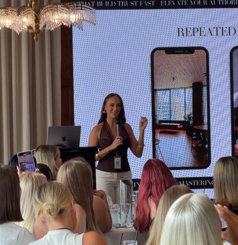 Taylah Small speaking on stage